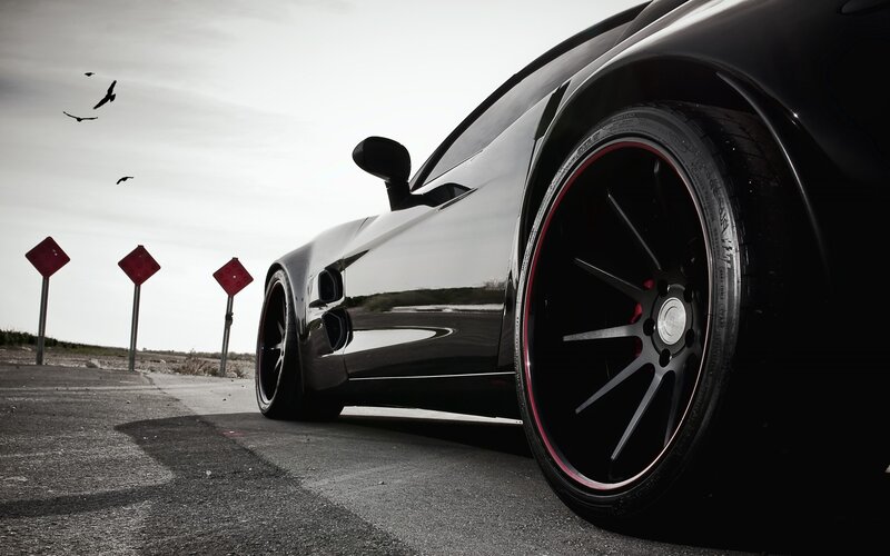 black sports car on road