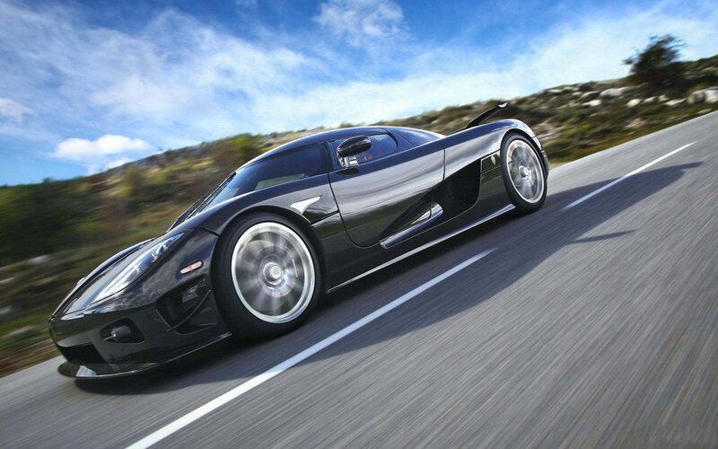 black sports car on road