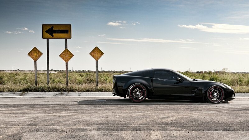 Black sports car on road