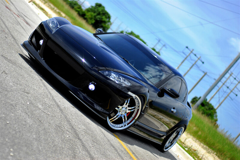 black sports car on road