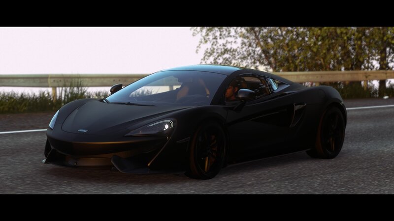 Black Sports Car on Road — Calm, Sunset