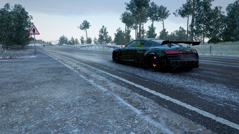 Black Sports Car on Road — Cold, Quiet
