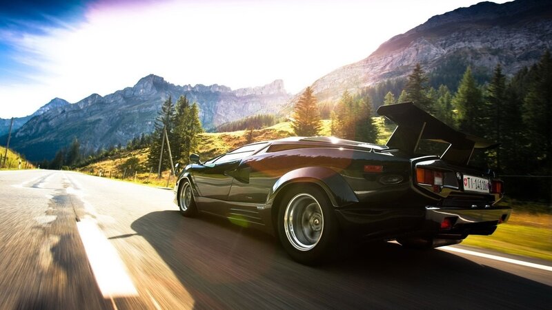 Black Sports Car on Road — Dramatic, Afternoon