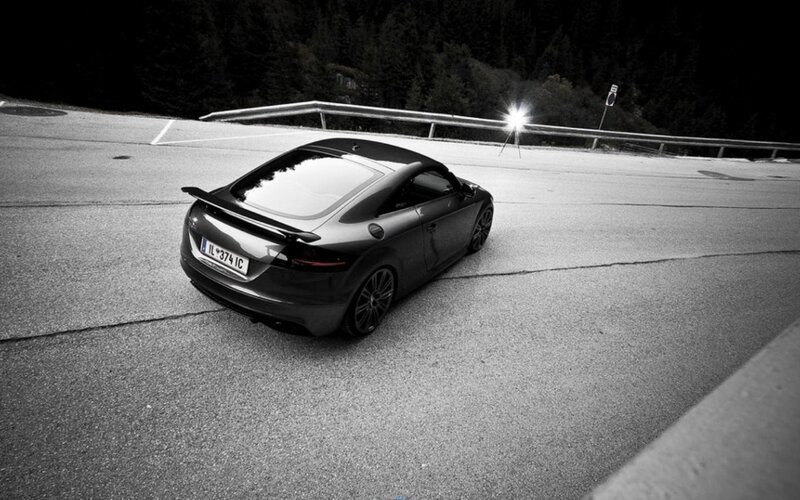 Black Sports Car on Road — Dramatic, Night, Photograph, Guardrail
