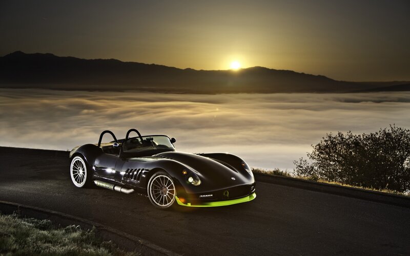 Black Sports Car on Road — Dramatic, Sunrise