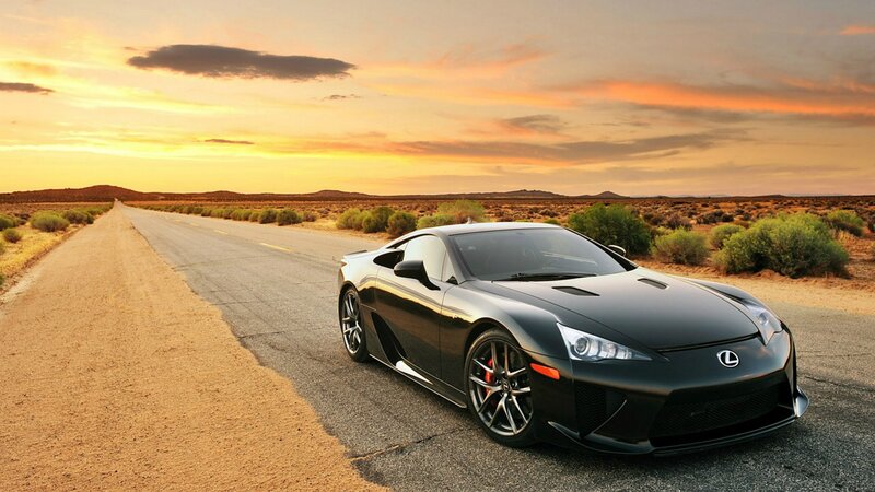 Black Sports Car on Road — Dramatic, Sunset, Photograph, Desert, Sky