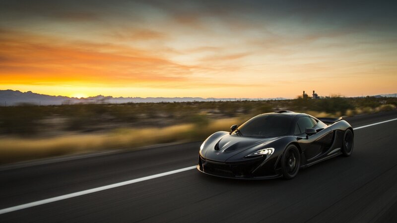Black Sports Car on Road — Dramatic, Sunset, Photograph, Mountains