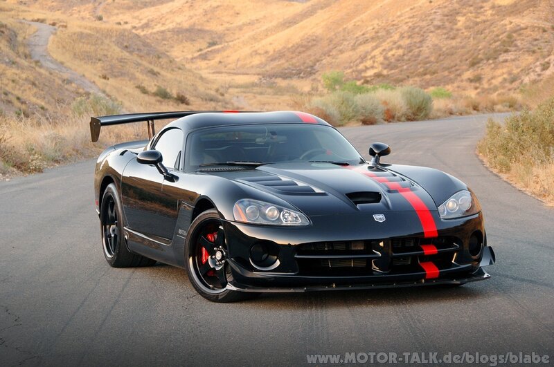 Black Sports Car on Road — Dramatic, Sunset