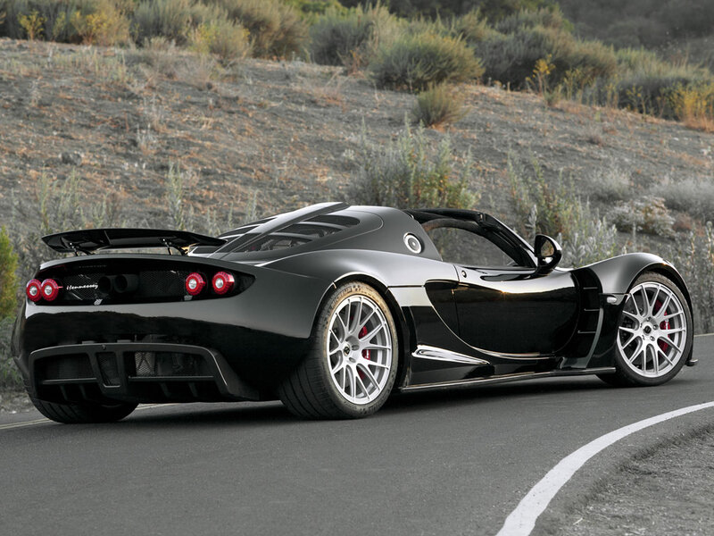 Black Sports Car on Road — Dynamic, Afternoon, Photograph, Hillside