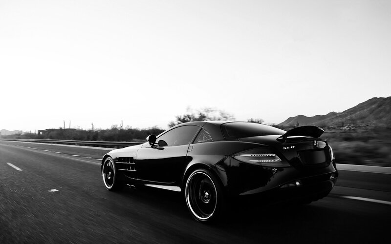 Black Sports Car on Road — Dynamic, Sunset