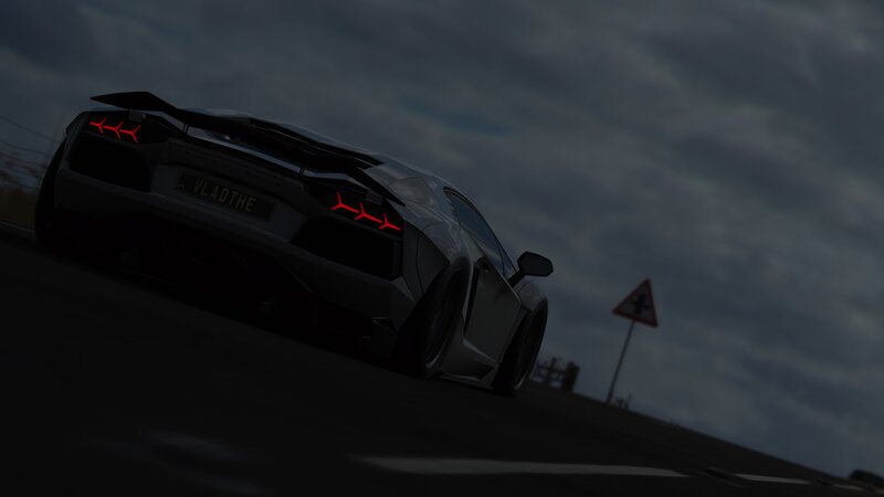 Black Sports Car on Road — Gray, Dark