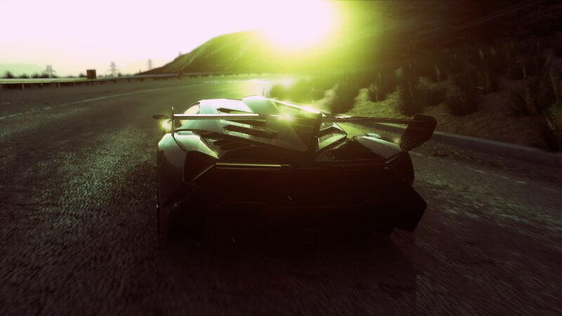 Black Sports Car on Road — Green, Dramatic