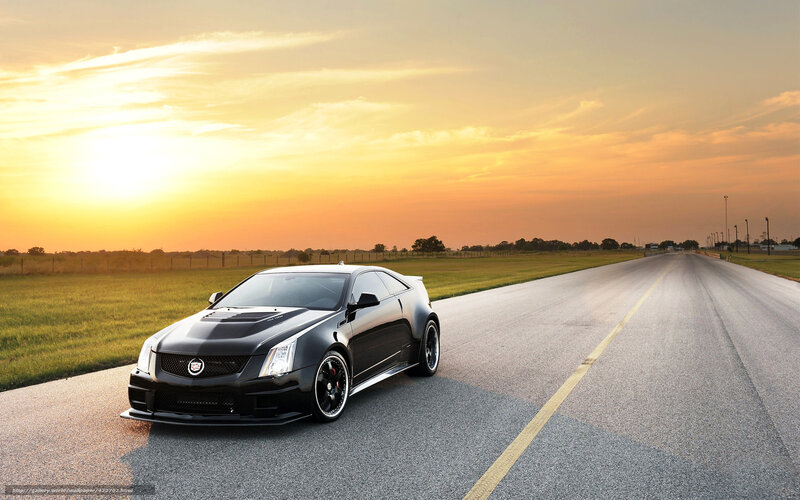 Black Sports Car on Road — Yellow