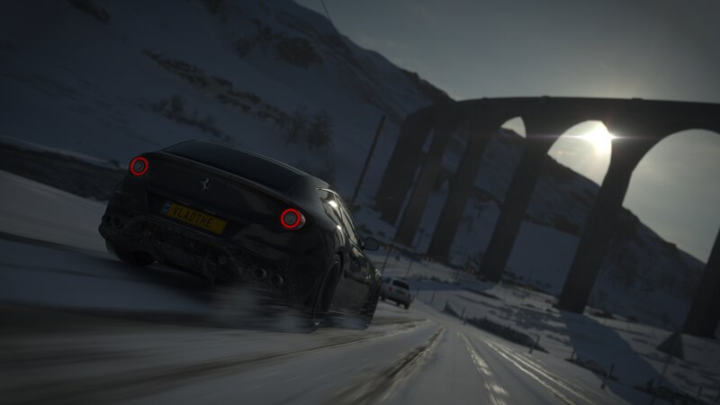 Black Sports Car on Snow — Dramatic