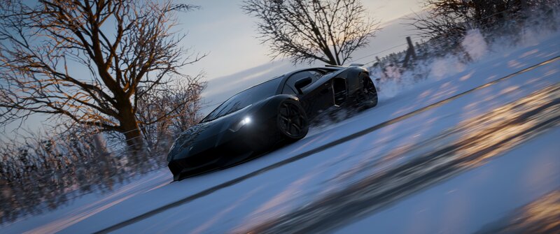 Black Sports Car on Snow — Dynamic