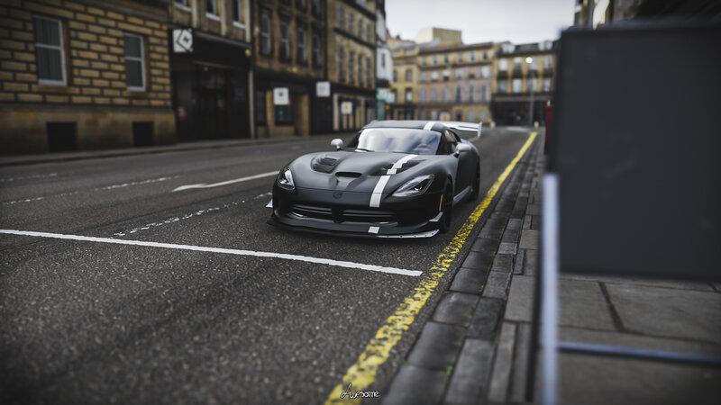 Black Sports Car on Street — Urban, Afternoon, Photograph, Building