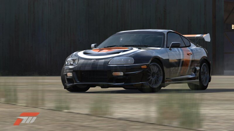 black sports car on track