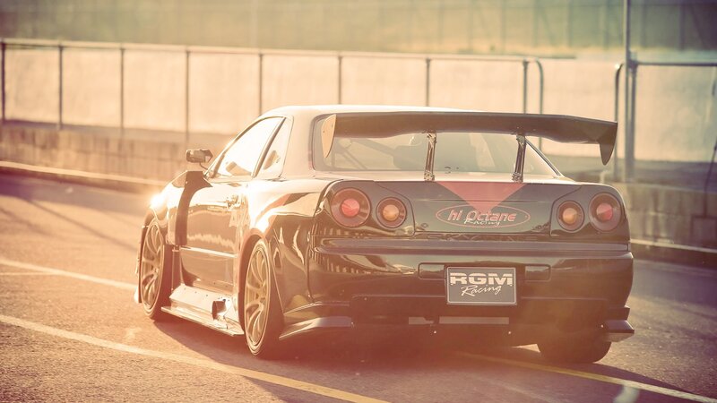 black sports car on track