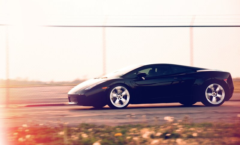 black sports car on track