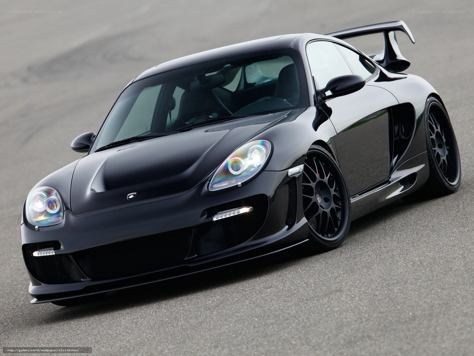 black sports car on track