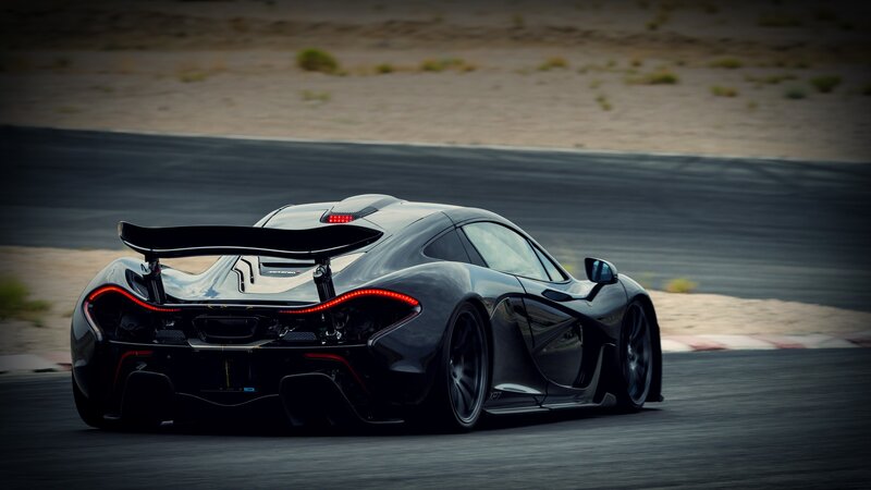 Black Sports Car on Track — Dramatic, Photograph