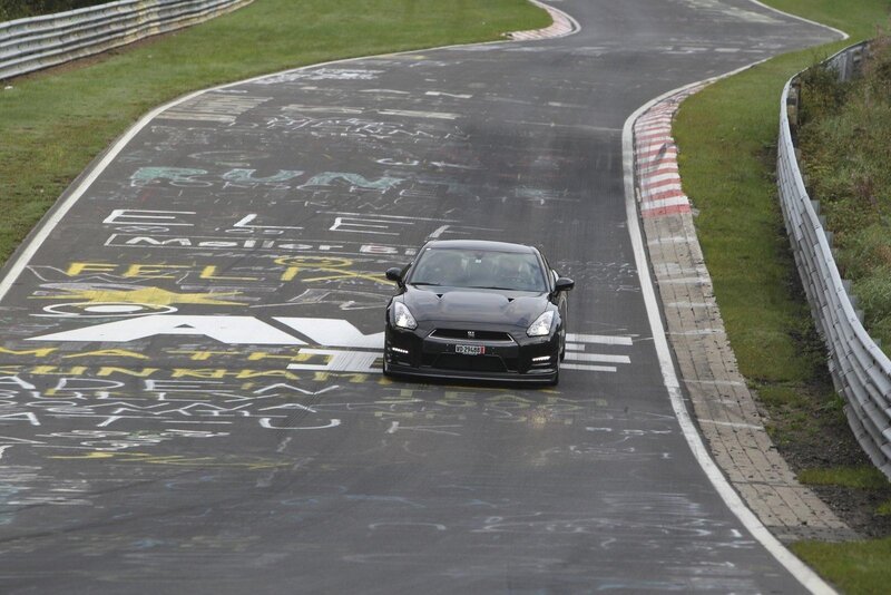 Black Sports Car on Track — Dynamic, Photograph, Race Track, Graffiti