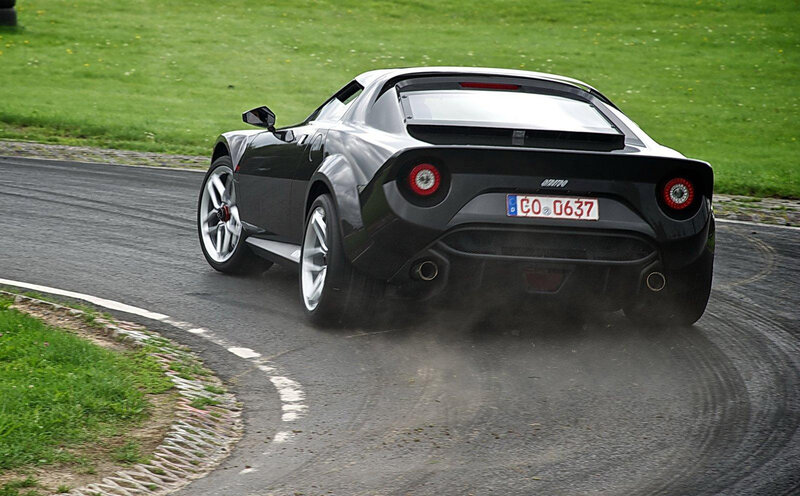 Black Sports Car on Track — Dynamic