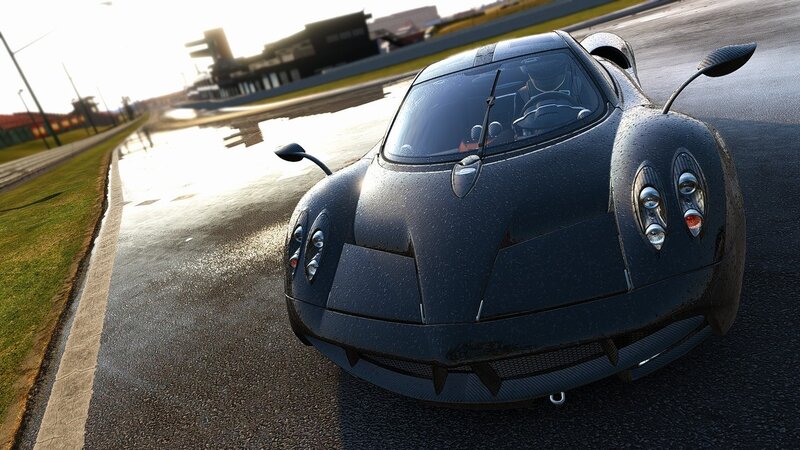 black sports car on wet track