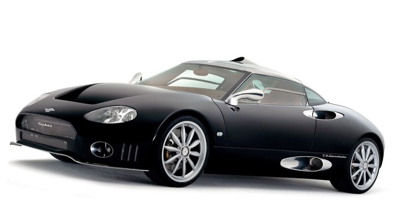 Black sports car on white background
