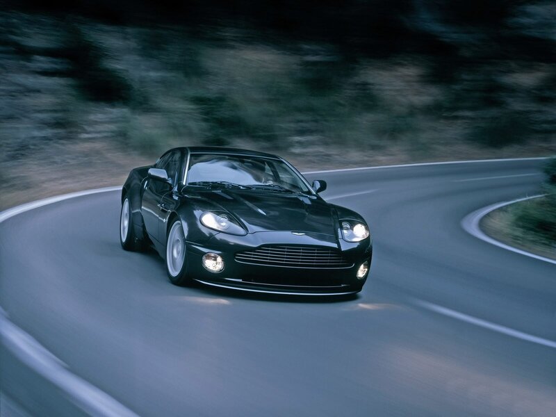 black sports car on winding road