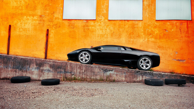Black Sports Car — Orange