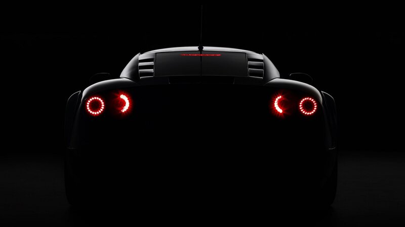 Black Sports Car Rear — Dramatic, Night, Photograph, Taillights