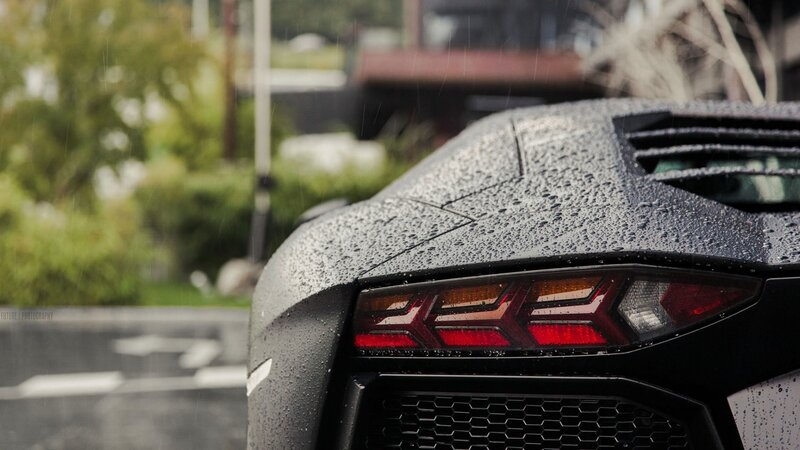 Black Sports Car Rear — Dramatic, Photograph, Raindrops