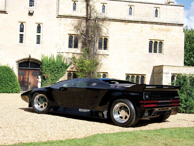 Black Sports Car — Serene, Afternoon, Photograph, Castle