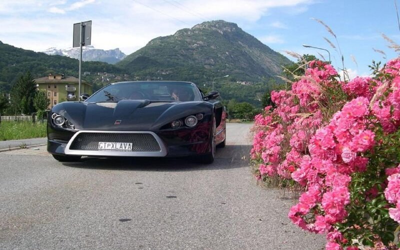 Black Sports Car — Serene, Afternoon, Photograph