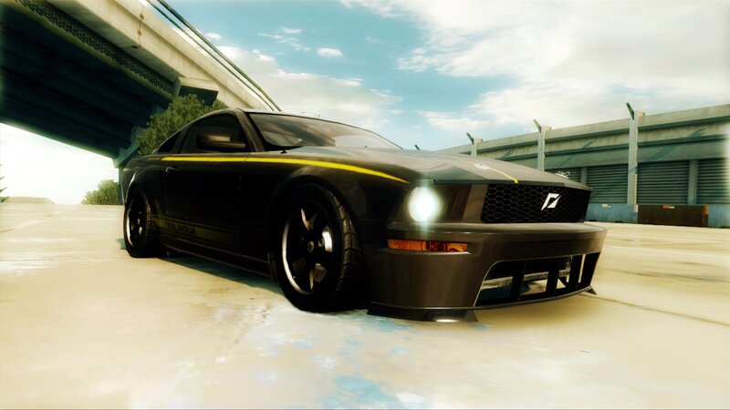black sports car under overpass