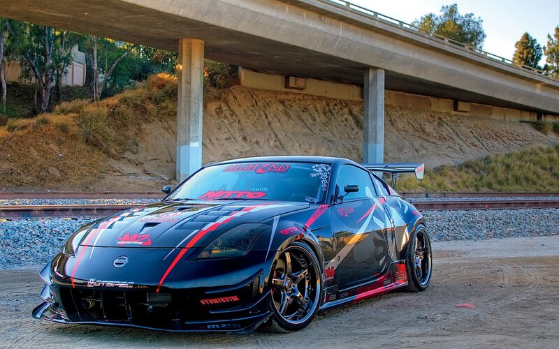 black sports car under overpass