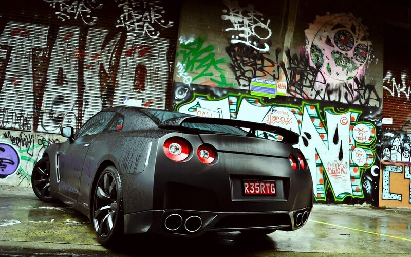 Black Sports Car — Urban, Photograph, Graffiti Wall