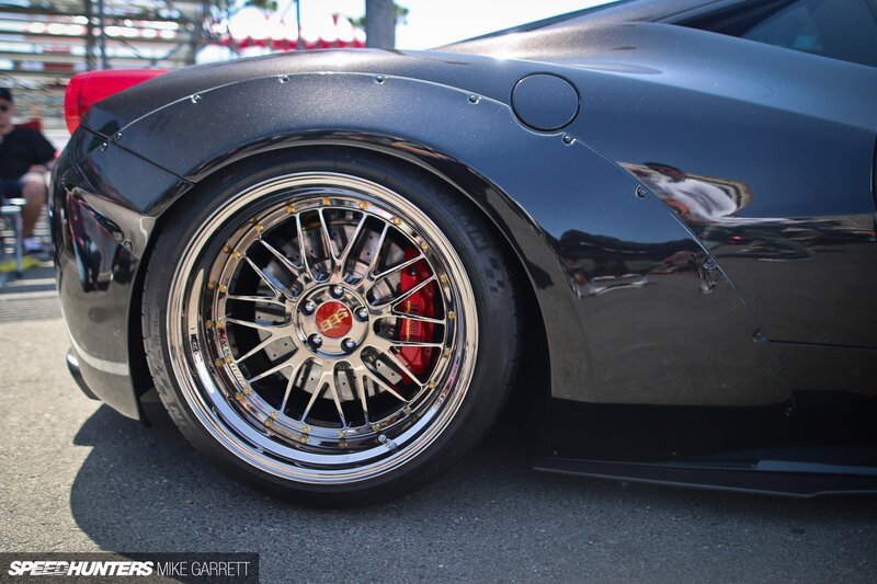 Black Sports Car Wheel — Dramatic, Afternoon