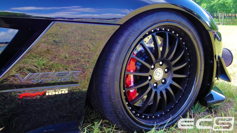 Black Sports Car Wheel — Dramatic