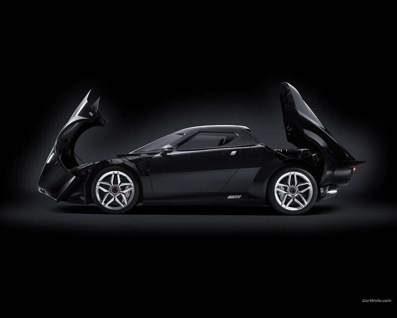 Black sports car with doors open