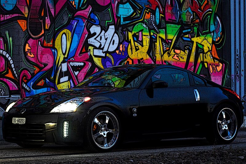 Black sports car with graffiti