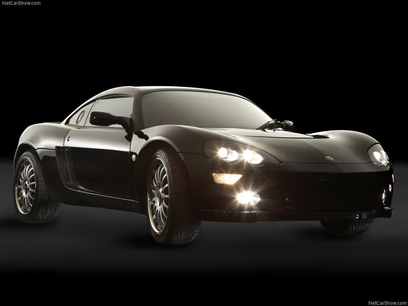 black sports car with headlights on