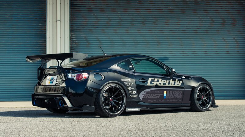 black sports car with large wing