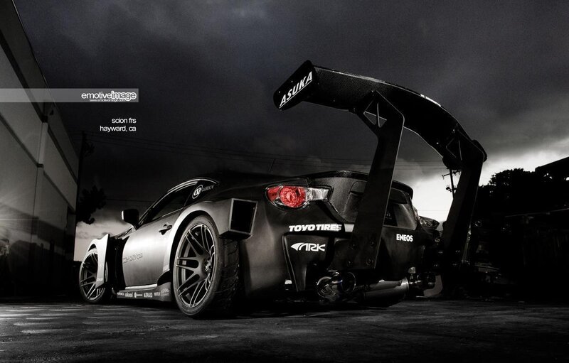 black sports car with large wing