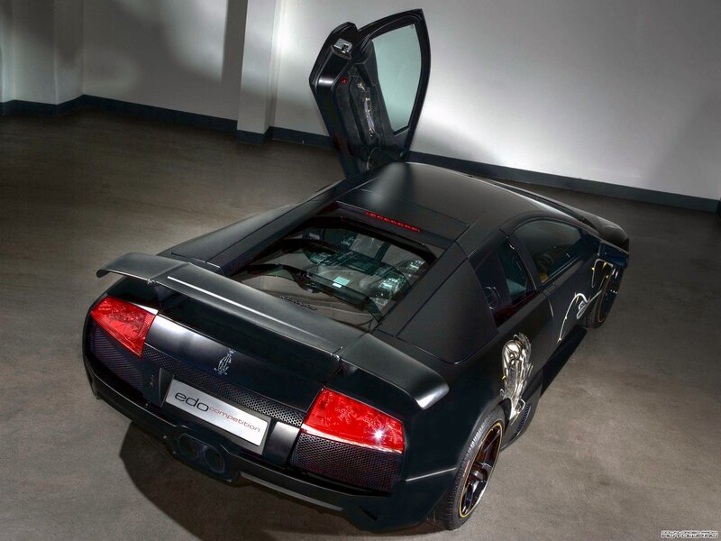 Black sports car with open door
