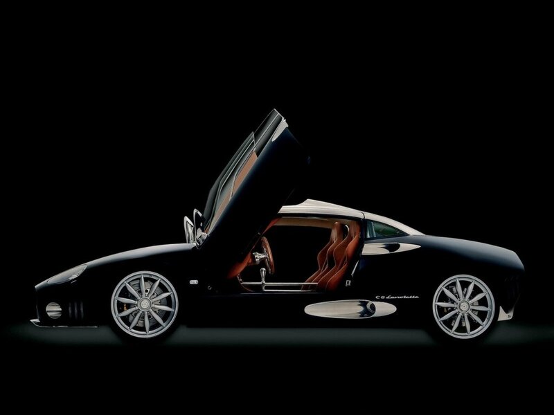 Black sports car with open door