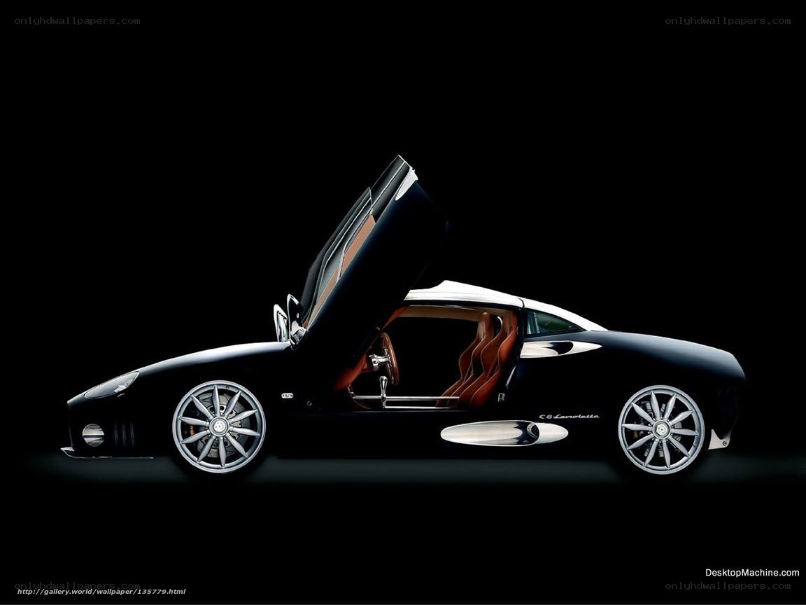 Black sports car with open door