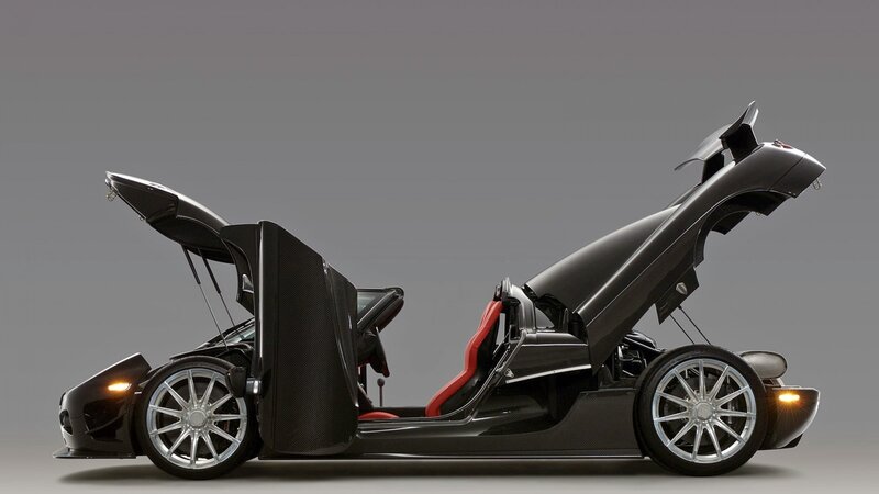black sports car with open doors
