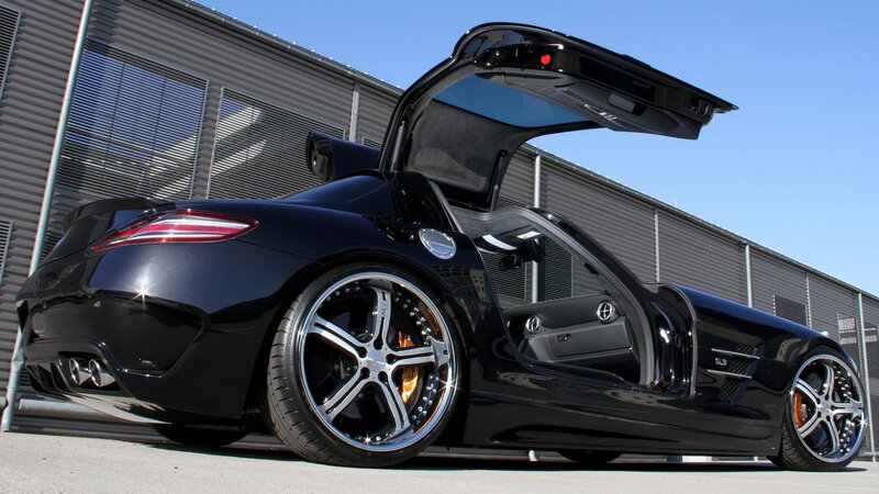 black sports car with open doors